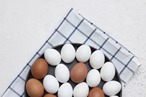 Natural Food Photography Prints: Chicken eggs on a checked kitchen towel on a light table