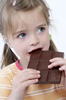 Chocolate Bar Photography Prints: Child eats chocolate