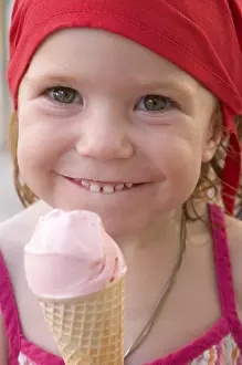Child Eating Ice Cream Prints: Child eats icecream