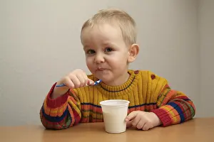 Healthy Dessert Options Prints: Child eats yogurt