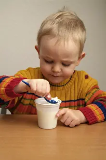Healthy Dessert Options Prints: Child eats yogurt