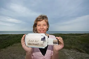 Recreational Activities For Kids Prints: Child with message in a bottle