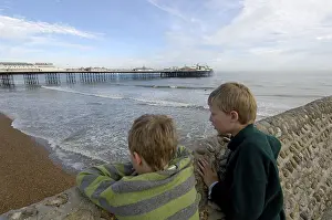 Prints of Children in front of the Pier Brighton West Sussex England Palace Prints: Colour Print of Children in front of Brighton Pier