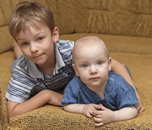 One Person Pose Prints: Children pose lying on a sofa