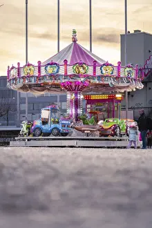 German Federal Republic Sunset Prints: Childrens carousel in the sunset