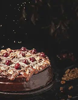 Baked Goods Studio Photography Prints: Chocolate cake with nuts and cherries