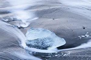 Icelandic Winter Scenery Prints: Chunks of ice on the black beach