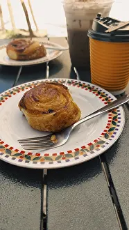 Cinnamon Roll Photography Prints: Cinnamon roll with coffee for take away