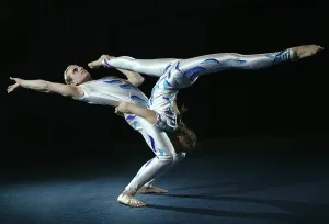 Circus Artist Prints: Circus artists perform different tricks. Gym split