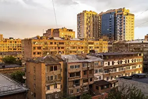 Prints of City block illuminated by orange sunset sun in Yerevan city Armenia in summer evening Armenia Prints: Yerevan City Block at Orange Sunset Print