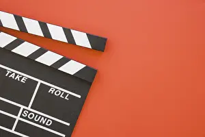 Clapperboard Print on Red Background with Space