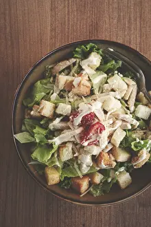 Selective Focus On Greens Prints: Classic Caesar salad, close-up
