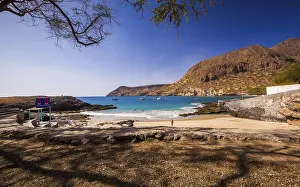 Deserted African Shoreline Prints: Clear blue bay