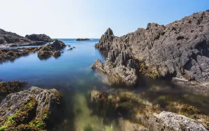 Deserted British Beaches Prints: Cliffs and rocks by the Bantham Beach