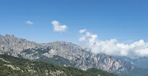 Steep Cliff France Prints: Cliffs and rocks in front of clouds