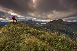 Mountain Peak Adventure Prints: Climber looking on the summit of the Widderstein