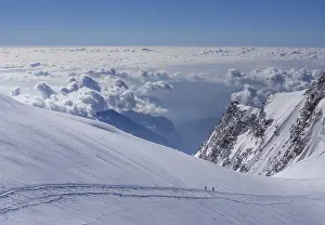 Prints of Two climbers above the clouds on Monte Rosa, Alps, Valle d'Aosta, Italy Two climbers above the clouds on Monte Rosa, Alps, Valle d'Aosta, Italy Aosta Prints: Two Climbers Above the Clouds Print, Monte Rosa, Italy