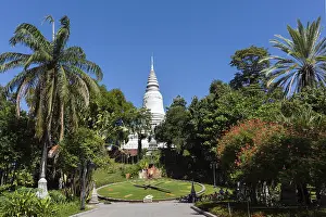 Southeast Asia Temple Architecture Prints: Clock in front of the stupa of Wat Phnom