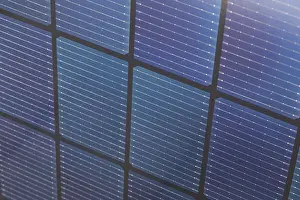 Solar Energy Generation Prints: Close up of bifacial solar panel cells with blue grid texture and black frame pattern