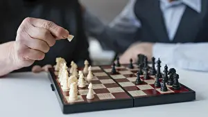 Retirement Hobby Ideas Prints: Close up elderly playing chess