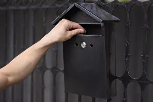 Close Up Prints: Close up hand touching mailbox