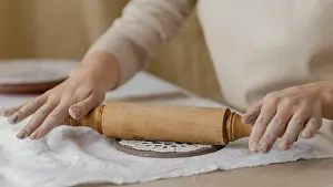 Kitchen Utensil Close Up Prints: Close up hands with rolling pin