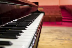 Deserted Concert Hall Prints: Close up piano front performance space
