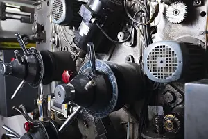 Metal Manufacturing Process Prints: Close-up on complex detail of typography machine