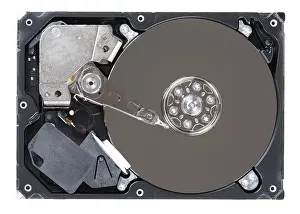 Electronic Technology Studio Shot Prints: Close-up inside view of hard disk isolated on white background