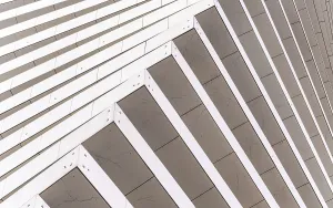 Geometric Architectural Style Prints: Close-up of a modern architectural facade featuring diagonal lines creating a dynamic pattern