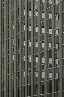 European Architectural Style Prints: Close-up of a modern building with a green window pattern