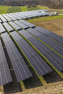 European Renewable Energy Prints: Close-up of structured solar modules over green fields