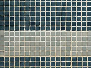 Mosaic Wall Decoration Prints: A close-up view of a wall featuring a pattern of square tiles