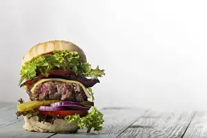 High Calorie Food Photography Prints: Closeup of a single cheeseburger