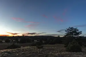 Evening Light In Europe Prints: Cloud and clear sky during a sunset