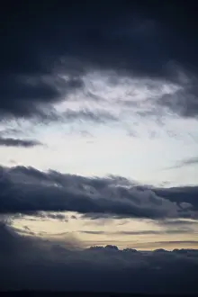 Overcast Evening Atmosphere Prints: Cloud hole at sunset, bizarre clouds