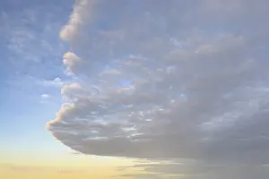 Altocumulus Cloud Formation Prints: Cloud front with stratocumulus clouds below Stratocumulus clouds with dynamic arc shape above Altocumulus under blue
