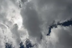 Cumulus Humilis Cloud Formation Prints: Clouds against a dark sky