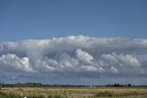 European Seaside Resort Prints: Clouds above the lagoon landscape