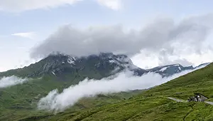 Central Europe Mountain Views Prints: Clouds move around mountain peaks