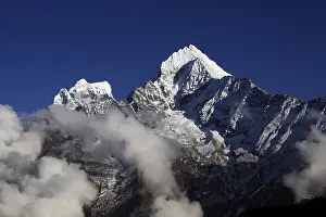 Snow Capped Mountains Asia Prints: Clouds in front of Mt. Kangtega and Mt