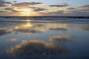 Evening Light Coastal Scene Prints: Cloudy reflection in coastal waters at sunset