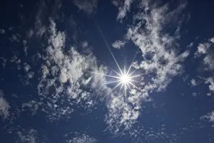 Light Beam Photography Prints: Cloudy sky with altocumulus clouds and sun rays