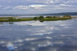 Nature Park Peenetal Prints: Cloudy sky landscape reflected in a vast