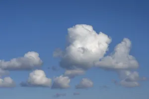 Cloudy Skies Germany Prints: Cluster clouds (Cululus) in the blue sky