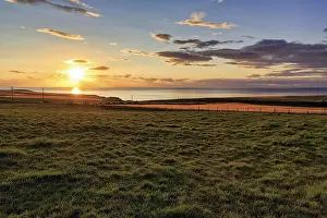 Deserted Meadow Landscape Prints: Coast with meadows and fields, sunset