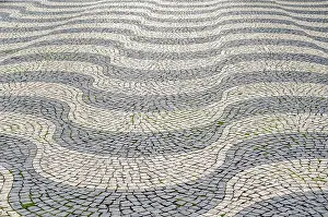 Deserted City Streets Prints: Detail of the cobblestone pavement in Lisbon