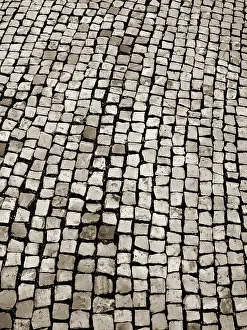 Europe Street Photography Prints: A cobblestone texture image