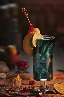 Sunset Atmosphere Prints: Cocktail in a glass with ice cube cubes