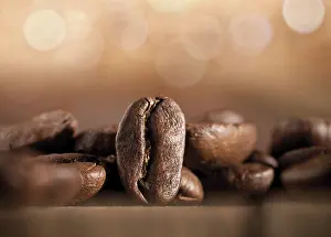 Close Up Coffee Beans Prints: Coffee beans on a blurred background